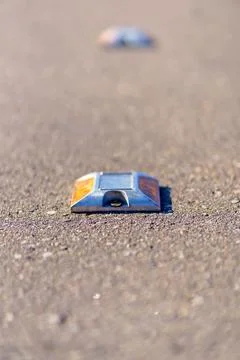 The light source is installed in the asphalt on the sidewalk Stock Photos