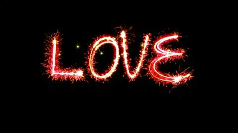 Light sparkling particles Text LOVE on black background. Stock Footage 155953470