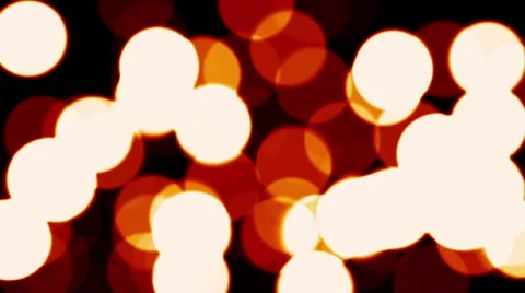 Light Spinning Spots Bubbles Warm Red Fuzzy Focus Bokeh Motion Background Loop Video stock 64960133