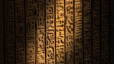 Light spot moving on egypt hieroglyphics Stock Footage 236465339