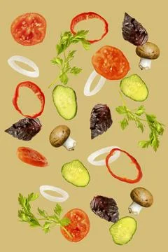 Light spring summer salad with flying floating in air ingredients, fresh vita Stock Photos