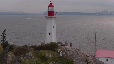 Light stands out on rock and Vavcouver in background Stock Footage 333645027