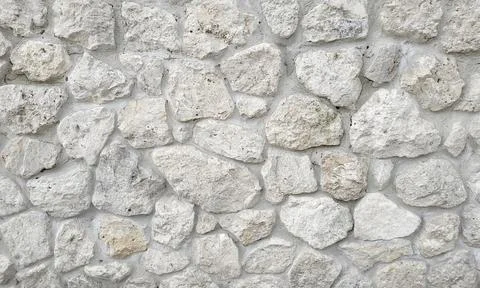 Light stone masonry texture background. Stone wall Foto stock