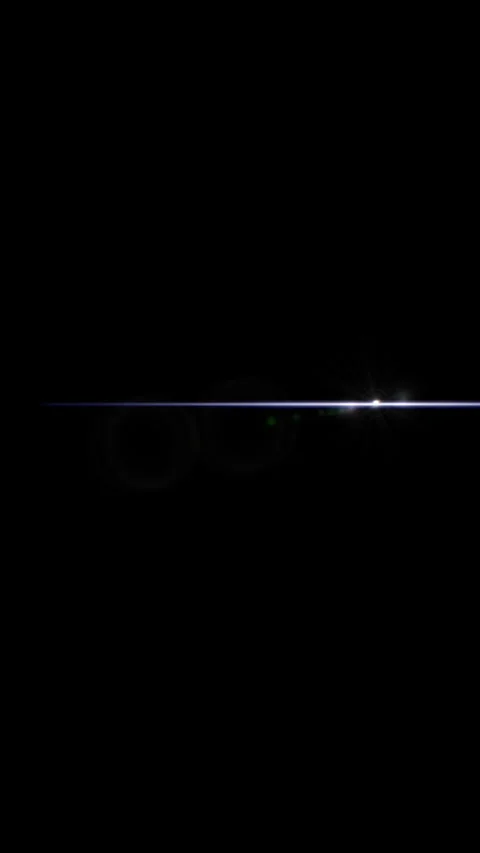 Light streaks across black background with radiating green and purple circles Stock Footage 328567579