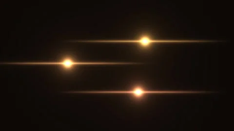 Light streaks move across a dark background in dynamic Stock Footage 338242084