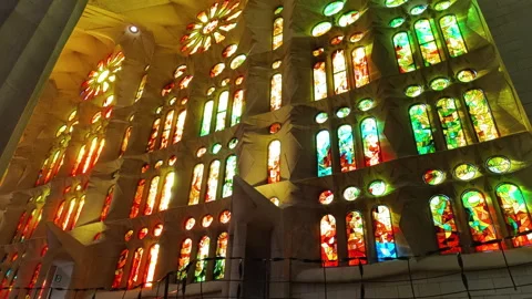 Light streaming inside the famous Sagrada Familia at Barcelona, Spain Stock Footage 328371556