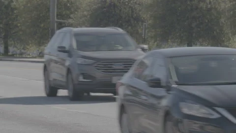 Light Suburban Traffic Stock Footage 148178906