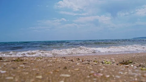 Light summer waves of the sea on a sandy beach Video stock 102722467