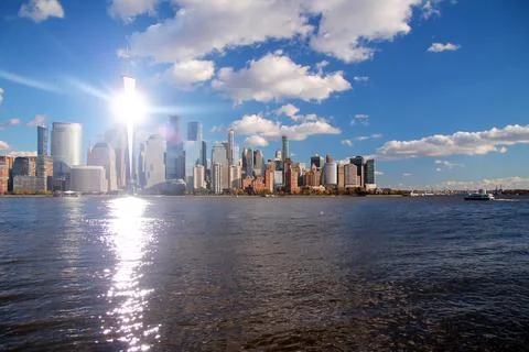 The light of the sun reflecting on the Hudson river from the Freedom Tower Stock Photos