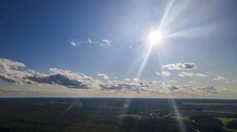 The light of the sun shining through the clouds in the sky. Amazing of fluffy Stock Photos