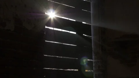 The light of the sun through the boards in the window Stock Footage 101143802