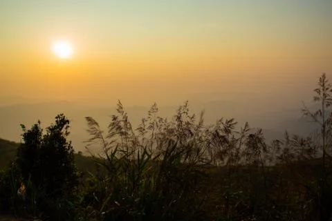 Light sunset behind the mountains Nern Chang Suek  hills, Kanchanaburi, Thail Stock Photos