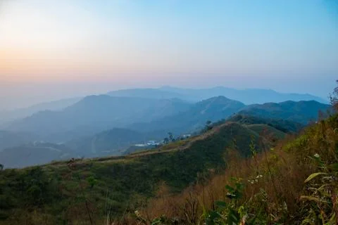 Light sunset behind the mountains Nern Chang Suek  hills, Kanchanaburi, Thail Stock Photos