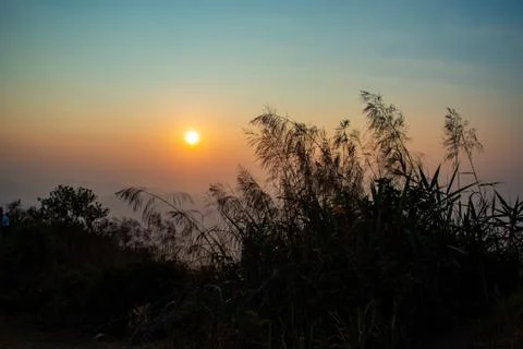 Light sunset behind the mountains Nern Chang Suek  hills, Kanchanaburi, Thail Stock Photos