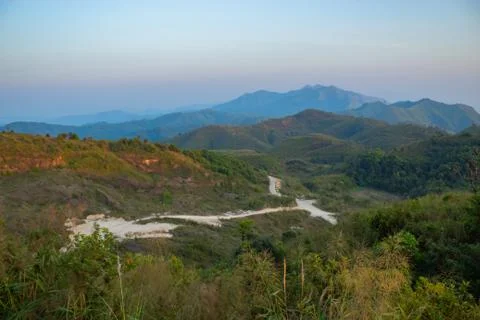 Light sunset behind the mountains Nern Chang Suek  hills, Kanchanaburi, Thail Stock Photos