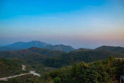 Light sunset behind the mountains Nern Chang Suek  hills, Kanchanaburi, Thail Stock Photos