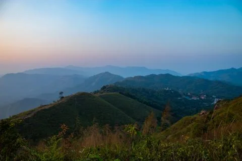 Light sunset behind the mountains Nern Chang Suek  hills, Kanchanaburi, Thail Stock Photos
