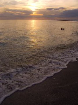 Light sunset rays falling on the waves Foto stock