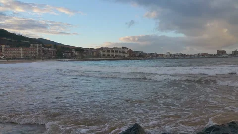 Light surf in the evening in the bay Castro-Urdiales, North Spain. Stock Footage 92537522