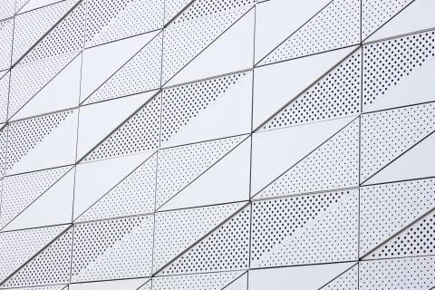 Light surface with geometric pattern with round openings Stock Photos