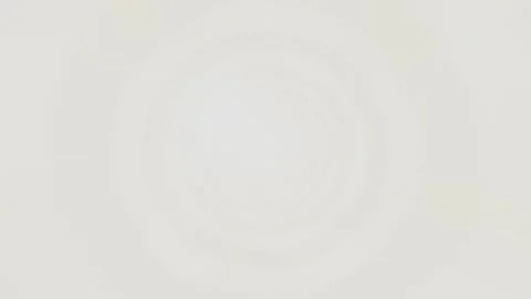 Light swirls create patterns in soft focus on a white background Stock Footage 337387757
