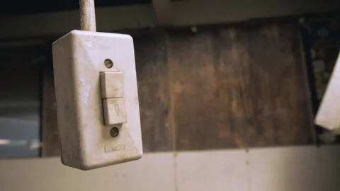 Light switch in abandoned fabric hall (lost places) 動画素材 79602447