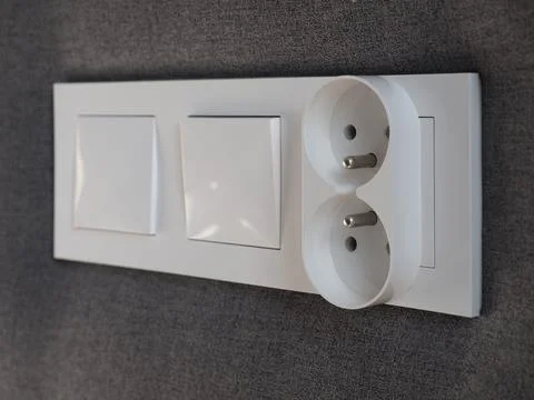 Light switch and power socket outlet Stock Photos