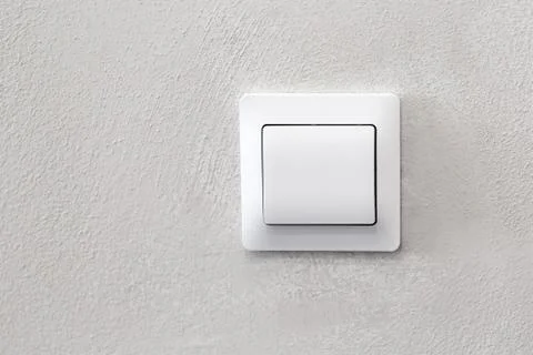 Light switch built into the texture wall Stock Photos