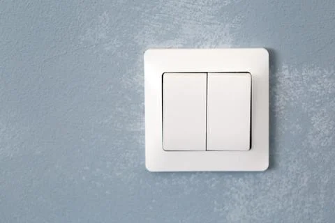 Light switch built into the texture wall Stock Photos