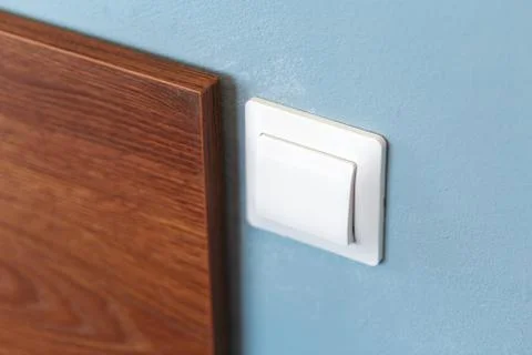 Light switch built into the texture wall Stock Photos
