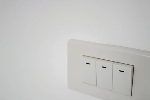 Light switch installation home interior photograph minimalist design close-.. Stock Photos