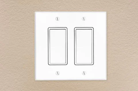 Light switch on wall Stock Photos