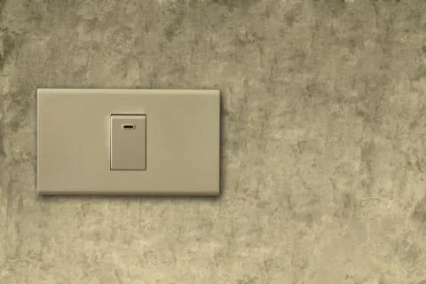 Light switch on wall Stock Photos