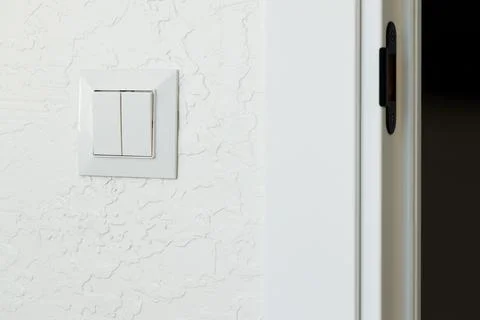 Light switcher equipment button white wall interior close up space concept .. Stock Photos