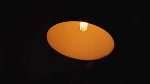 The light in the table lamp turns off Stock Footage 261150753