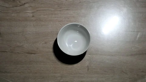 Light testing in real life. The small bowl was put in the center of floor. And t Stock Footage 142628183