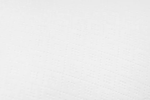 Light textile background with a clear texture and a small geometric pattern. Stock Photos