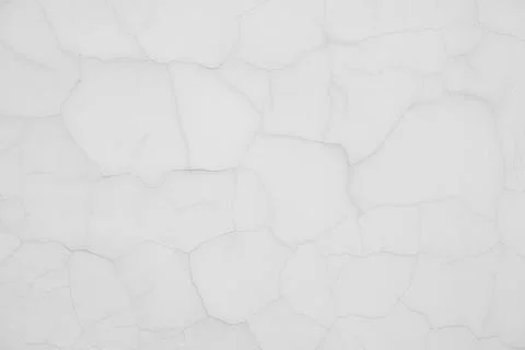 Light texture of thin neat cracks on the wall, similar to wallpaper. Stock Photos