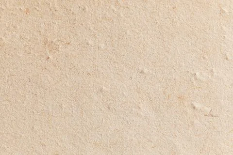 Light textured paper background with subtle patterns and natural fibers visib Stock Photos