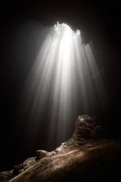 Light from the top of Jomblang Cave in Java island, Indonesia Light from t... Fotos de archivo