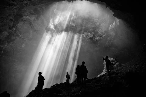 Light from the top of Jomblang Cave in Java island, Indonesia (black and w... Fotos Stock