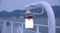 Light On Top Of Ship With Passing Boat And Coastal City And Mountains 4k or 4k+ Resolution