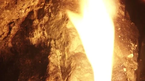 Light a torch in a cave or grotto. Enigmatic, mysterious  Vídeo Stock 59750816