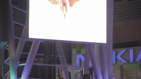 Light Tower and Big-Screen Video Tilt Up Stock Footage 8913677