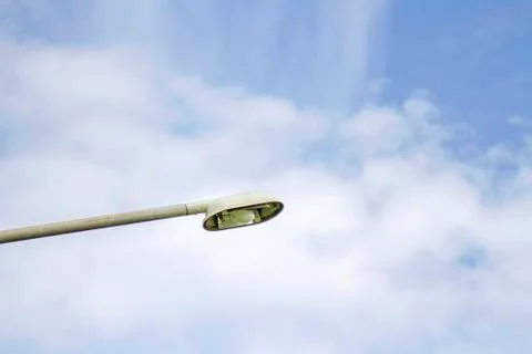 The light tower is broken with blue sky. Stock Photos