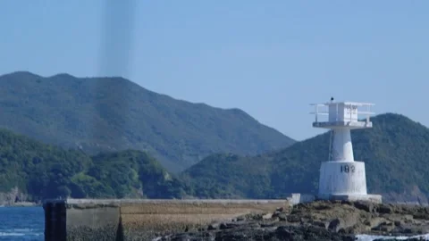 Light tower on the shore of the sea, Sai Kung Hong Kong Stock Footage 295918376