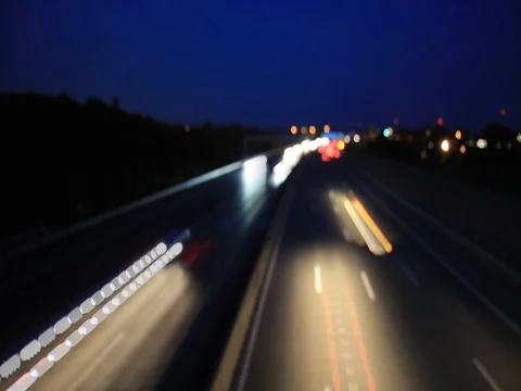 Light trace from busy night traffic on the highway Video stock 80367885
