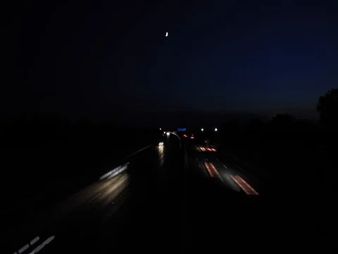 Light trace from busy night traffic on the highway Video stock 80368228