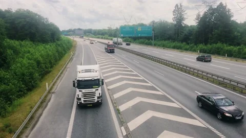 Light traffic on the E20 motorway that connects Jutland with Copenhagen Stock Footage 157924477
