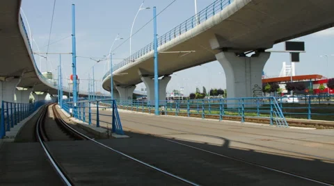 Light Traffic Under And Over A Big Bridge In The Middle Of The City Video stock 63161747